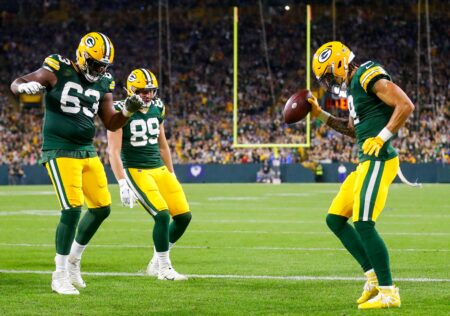Green Bay Packers wide receiver Christian Watson (9) celebrates with offensive tackle Rasheed Walker (63) and tight end Ben Sims (89) after scoring a touchdown against the Detroit Lions during their football game on Thursday, September 28, 2023, at Lambeau Field in Green Bay, Wis. The Lions won the game, 34-20. Tork Mason/USA TODAY NETWORK-Wisconsin