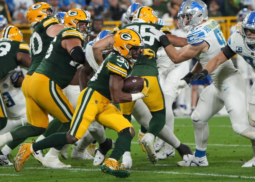 Green Bay Packers running back Aaron Jones (33) runs for a short gain during the third quarter of their game Thursday, September 28, 2023 at Lambeau Field in Green Bay, Wis. The Detroit Lions beat the Green Bay Packers 34-20.