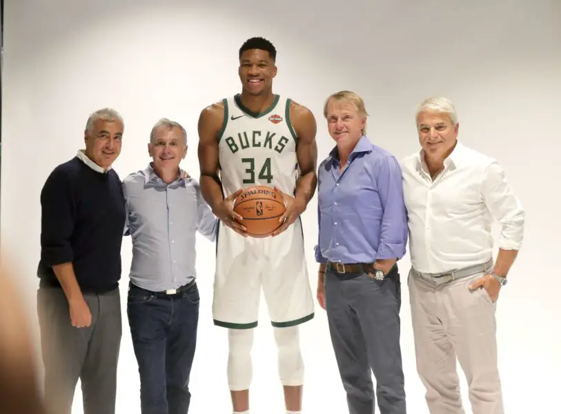 Sep 24, 2018; Milwaukee, WI, USA; Milwaukee Bucks forward Giannis Antetokounmpo (34) poses for a photo with Bucks co-owners (from left) Marc Lasry and Jamie Dinan and Wes Edens and Mike Fascitelli during Milwaukee Bucks media day at the Fiserv Forum. Mandatory Credit: Mike De Sisti/Milwaukee Journal Sentinel via USA TODAY NETWORK