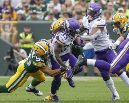 Green Bay Packers inside linebacker Blake Martinez (50) and outside linebacker Za'Darius Smith (55) tackle Minnesota Vikings running back Dalvin Cook (33) during their football game Sunday, September 15, 2019, at Lambeau Field in Green Bay, Wis. © Joshua Clark/USA TODAY NETWORK-Wis via Imagn Content Services, LLC