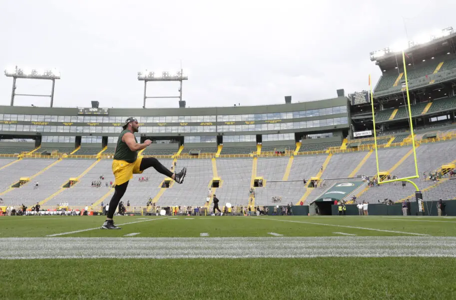 Aug 19, 2022; Green Bay, Wisconsin, USA; Green Bay Packers offensive tackle David Bakhtiari (69) warms up before the team plays the New Orleans Saints at Lambeau Field. Mandatory Credit: Dan Powers-USA TODAY NETWORK
