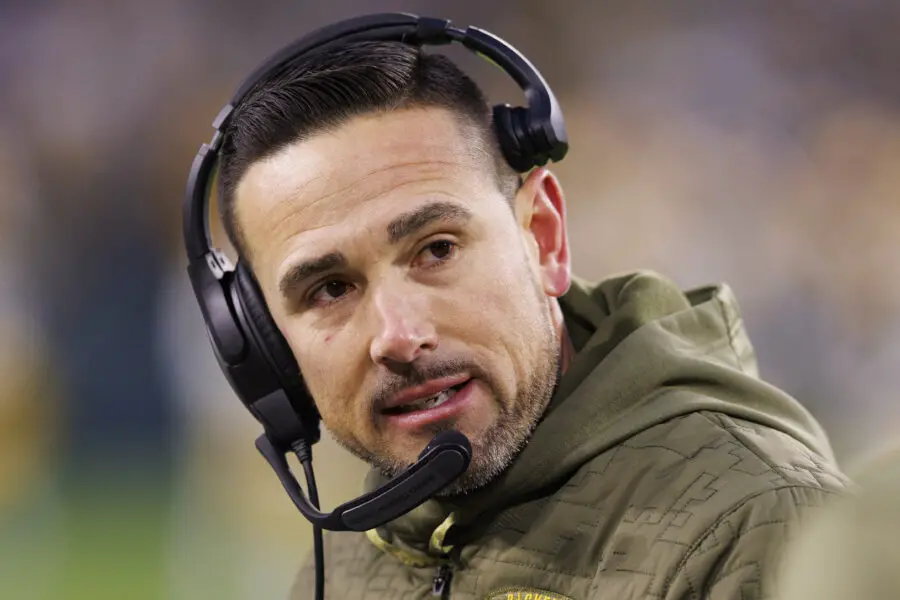 Nov 13, 2022; Green Bay, Wisconsin, USA; Green Bay Packers head coach Matt LaFleur talks with an assistant coach during the second quarter against the Dallas Cowboys at Lambeau Field. Mandatory Credit: Jeff Hanisch-USA TODAY Sports