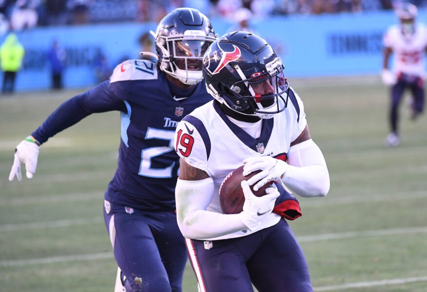 Dec 24, 2022; Nashville, Tennessee, USA; Houston Texans wide receiver Amari Rodgers (19) catches a pass along the sideline against Tennessee Titans cornerback Roger McCreary (21) during the second half at Nissan Stadium. Mandatory Credit: Christopher Hanewinckel-USA TODAY Sports (Green Bay Packers)