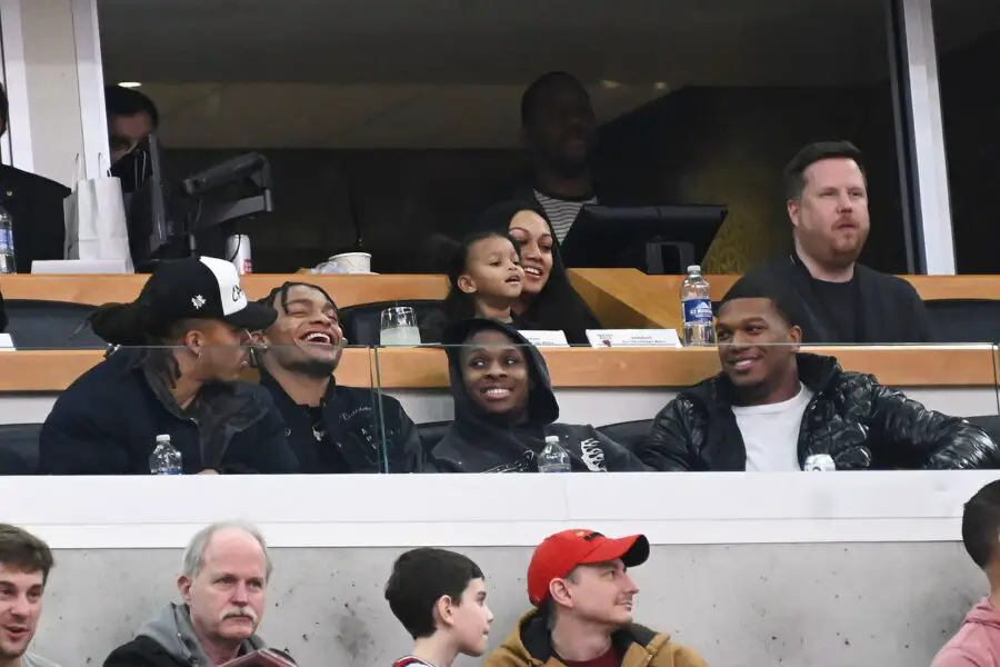 Mar 15, 2023; Chicago, Illinois, USA; Chicago Bears players (from left) Chase Claypool, Justin Fields, Darnell Mooney and DJ Moore laugh from the stands during the second half of the game between the Chicago Bulls and the Sacramento Kings at the United Center. Mandatory Credit: Matt Marton-USA TODAY Sports (Green Bay Packers)
