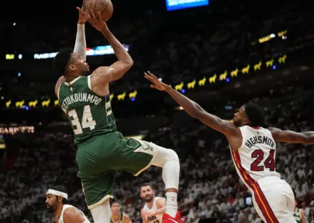 Apr 24, 2023; Miami, Florida, USA; Milwaukee Bucks forward Giannis Antetokounmpo (34) takes a shot over Miami Heat forward Haywood Highsmith (24) in the first quarter during game four of the 2023 NBA Playoffs at Kaseya Center. Mandatory Credit: Jim Rassol-USA TODAY Sports