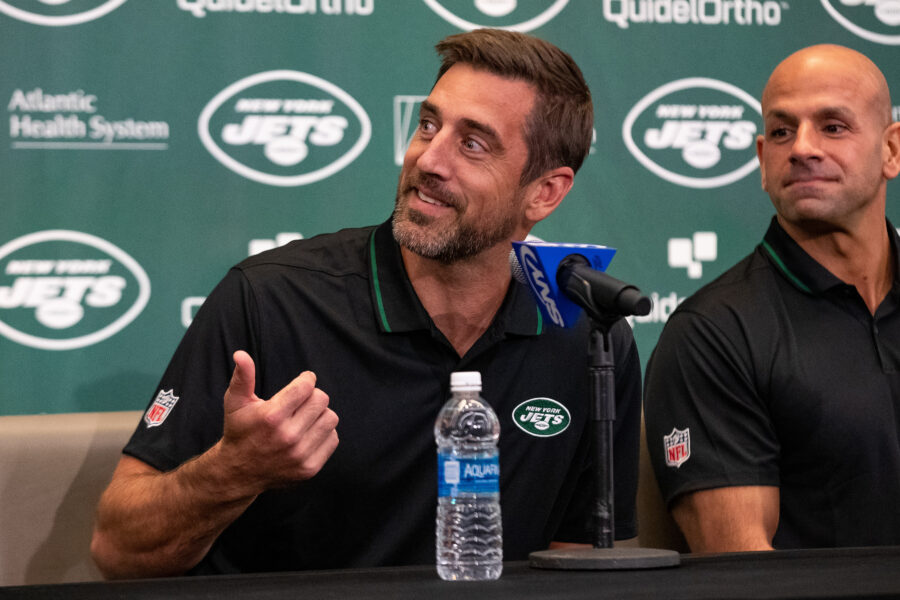 Apr 26, 2023; Florham Park, NJ, USA; New York Jets quarterback Aaron Rodgers (8) answers questions during the introductory press conference at Atlantic Health Jets Training Center. Mandatory Credit: Tom Horak-USA TODAY Sports