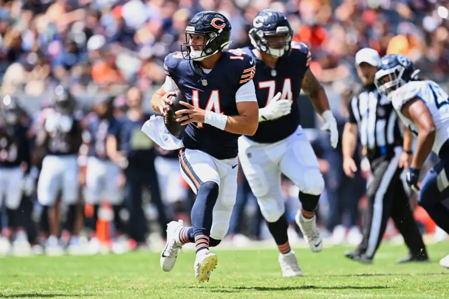 Aug 12, 2023; Chicago, Illinois, USA; Chicago Bears quarterback Nathan Peterman (14) runs in the second half against the Tennessee Titans at Soldier Field. Mandatory Credit: Jamie Sabau-USA TODAY Sports (Green Bay Packers)