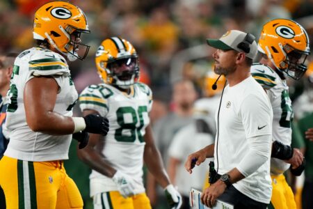 Green Bay Packers head coach Matt LaFleur walks onto the field between possession during a Week 1 NFL preseason game between the Green Bay Packers and the Cincinnati Bengals,Friday, Aug. 11, 2023, at Paycor Stadium in Cincinnati.© Kareem Elgazzar/The Enquirer / USA TODAY NETWORK