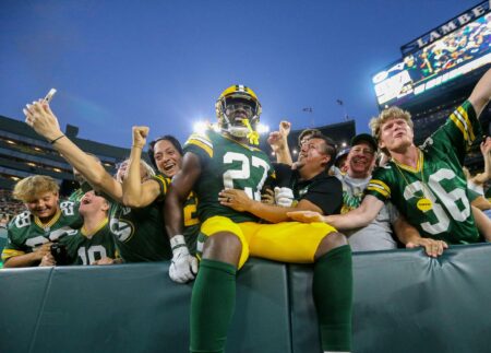 Green Bay Packers running back Patrick Taylor (27) celerates with a Lambeau Leap after scoring a touchdown the New England Patriots during their preseason football game Saturday, August 19, 2023, at Lambeau Field in Green Bay, Wis. Tork Mason/USA TODAY NETWORK-Wisconsin