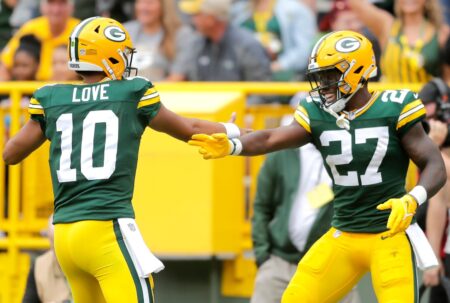 Green Bay Packers quarterback Jordan Love (10) and running back Patrick Taylor (27) react after a Christian Watson (9) touchdown reception against Seattle Seahawks' during their preseason football game Saturday, August 26, 2023, at Lambeau Field in Green Bay, Wis. Green Bay defeated Seattle 19-15. Wm. Glasheen USA TODAY NETWORK-Wisconsin
