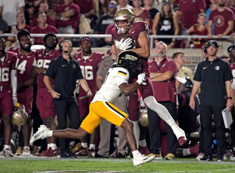 Sep 9, 2023; Tallahassee, Florida, USA; Florida State Seminoles wide receiver Johnny Wilson (14) cannot reel in a pass as he is defended by Southern Miss Golden Eagles defensive back Brendan Toles (0) during the first half at Doak S. Campbell Stadium. Mandatory Credit: Melina Myers-USA TODAY Sports (Green Bay Packers)