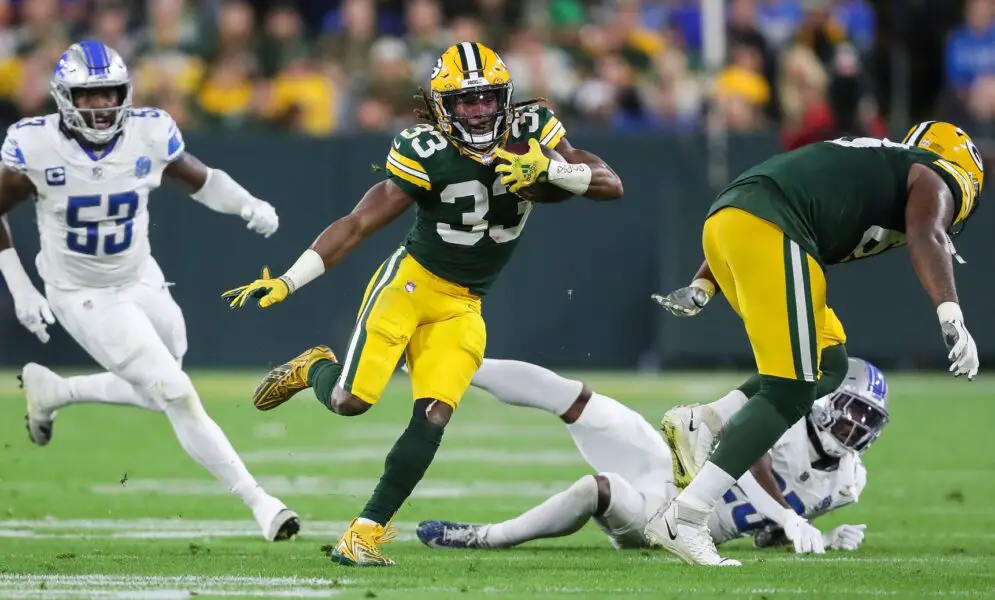 Green Bay Packers running back Aaron Jones (33) runs the ball against the Detroit Lions during their football game on Thursday, September 28, 2023, at Lambeau Field in Green Bay, Wis. The Lions won the game, 34-20. Tork Mason/USA TODAY NETWORK-Wisconsin (Aaron Rodgers)