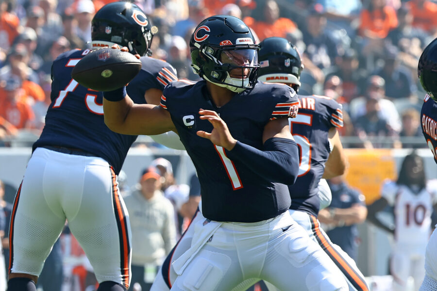 Oct 1, 2023; Chicago, Illinois, USA; Chicago Bears quarterback Justin Fields (1) drops back to pass/ against the Denver Broncos during the first half at Soldier Field. Mandatory Credit: Mike Dinovo-USA TODAY Sports