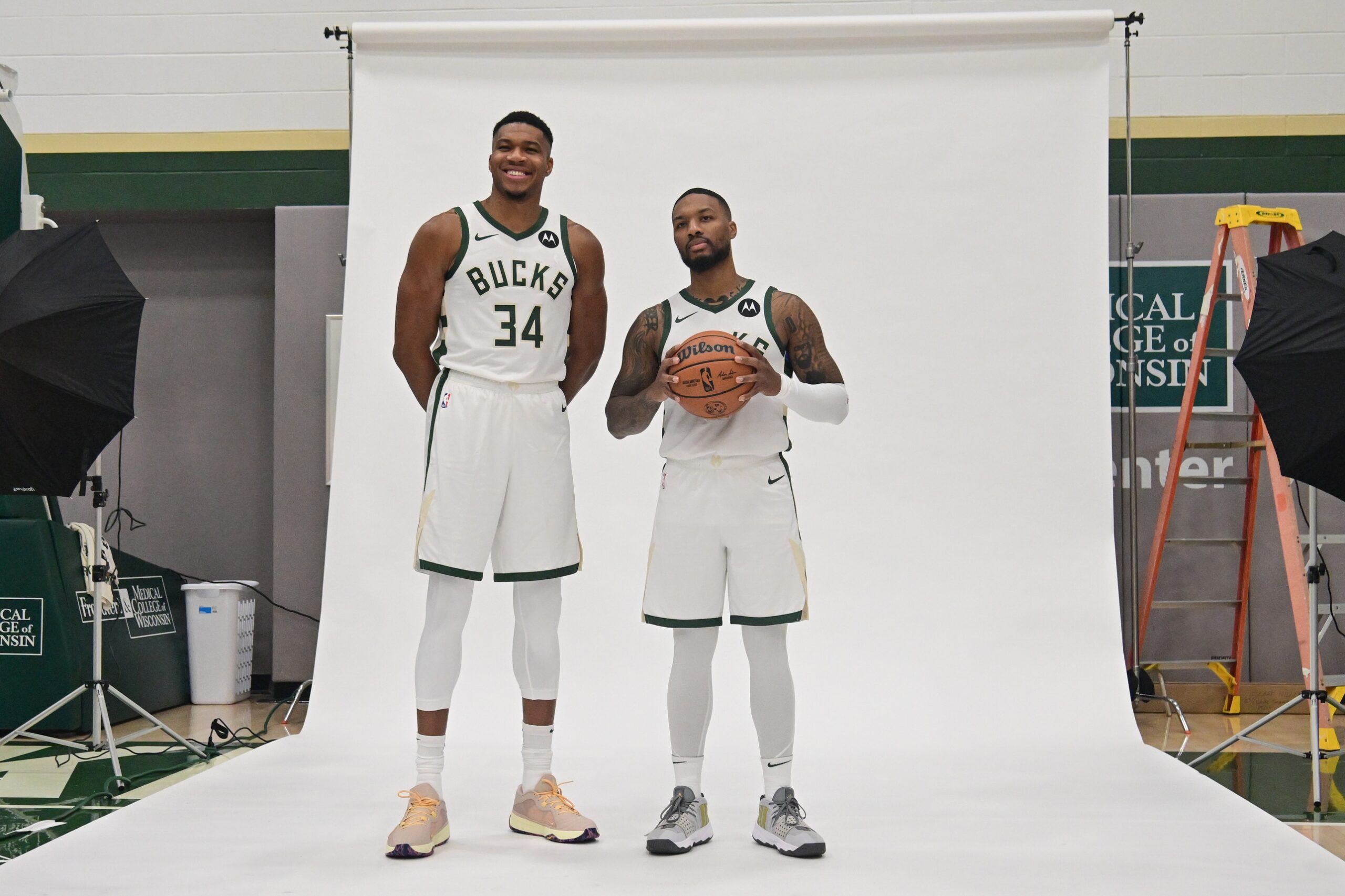 Oct 2, 2023; Milwaukee, WI, USA; Milwaukee Bucks forward Giannis Antetokounmpo (34) and guard Damian Lillard (0) pose for a picture during media day in Milwaukee. Mandatory Credit: Benny Sieu-USA TODAY Sports