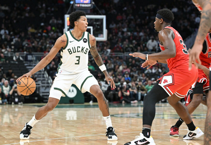 Oct 8, 2023; Milwaukee, Wisconsin, USA; Milwaukee Bucks forward MarJon Beauchamp (3) dribbles the ball against Chicago Bulls forward Terry Taylor (32) in the second half at Fiserv Forum. Mandatory Credit: Michael McLoone-USA TODAY Sports