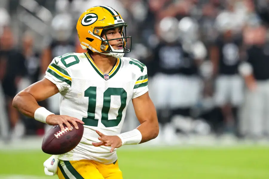 Oct 9, 2023; Paradise, Nevada, USA; Green Bay Packers quarterback Jordan Love (10) is flushed from the pocket by the Las Vegas Raiders during the first quarter at Allegiant Stadium. Mandatory Credit: Stephen R. Sylvanie-USA TODAY Sports