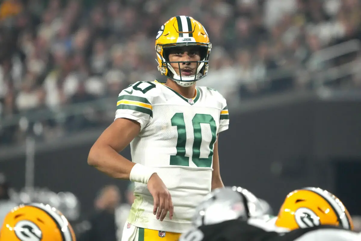 Oct 9, 2023; Paradise, Nevada, USA; Green Bay Packers quarterback Jordan Love (10) prepares to take the snap against the Las Vegas Raiders in the second half at Allegiant Stadium. Mandatory Credit: Kirby Lee-USA TODAY Sports