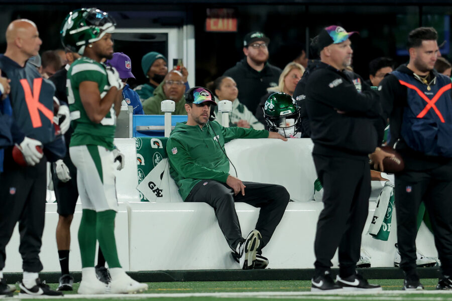 Oct 15, 2023; East Rutherford, New Jersey, USA; New York Jets injured quarterback Aaron Rodgers sits on the bench during the fourth quarter against the Philadelphia Eagles at MetLife Stadium. Mandatory Credit: Brad Penner-USA TODAY Sports