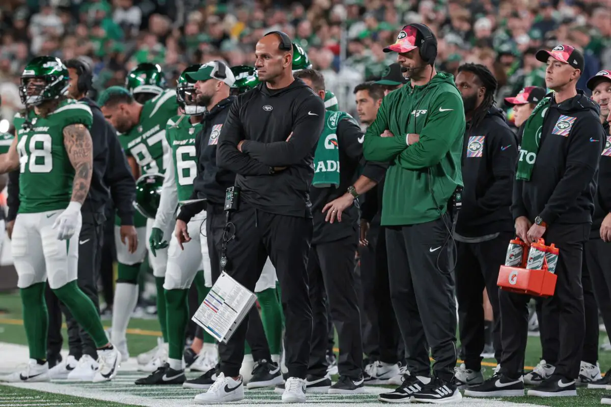 Oct 15, 2023; East Rutherford, New Jersey, USA; New York Jets head coach Robert Saleh (left) an dquarterback Aaron Rodgers (right) looks on during the second half against the Philadelphia Eagles at MetLife Stadium. Mandatory Credit: Vincent Carchietta-USA TODAY Sports (Green Bay Packers)