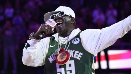 Oct 29, 2023; Milwaukee, Wisconsin, USA; Flavor Flav singing the National Anthem before the Milwaukee Bucks and Atlanta Hawks game at Fiserv Forum. Mandatory Credit: Michael McLoone-USA TODAY Sports