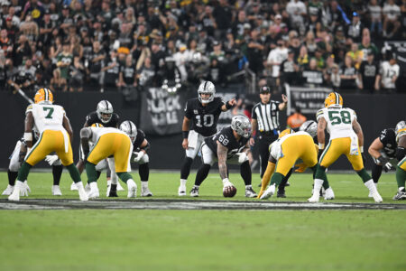 Jimmy Garoppolo (10) of the Las Vegas Raiders calls a play at the line during the first quarter against the Green Bay Packers at Allegiant Stadium in Las Vegas on Oct. 9, 2023. (Candice Ward/Getty Images)