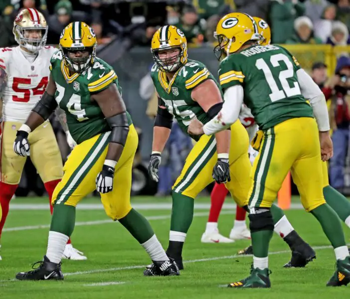 Green Bay Packers offensive tackle Byron Bell (74), offensive tackle Bryan Bulaga (75) and offensive guard Lane Taylor (65) look back at quarterback Aaron Rodgers (12) against the San Francisco 49ers at Lambeau Field Monday, October 15, 2018 in Green Bay, Wis. © Jim Matthews/USA TODAY NETWORK-