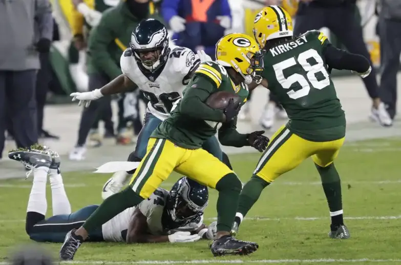 Dec 6, 2020; Green Bay, WI, USA; Green Bay Packers free safety Darnell Savage (26) runs back an interception against the Philadelphia Eagles in the fourth quarter during their football game Sunday, December 6, 2020, at Lambeau Field in Green Bay, Wis. Mandatory Credit: Dan Powers-USA TODAY NETWORK