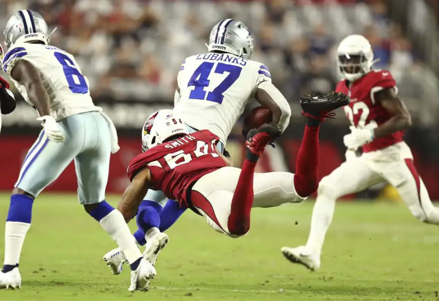 Aug 13, 2021; Glendale, Arizona, USA; Dallas Cowboys tight end Nick Eubanks (47) is tackled by Arizona Cardinals inside linebacker Terrance Smith (54) in the second half at State Farm Stadium. Mandatory Credit: Billy Hardiman-USA TODAY Sports (Green Bay Packers)