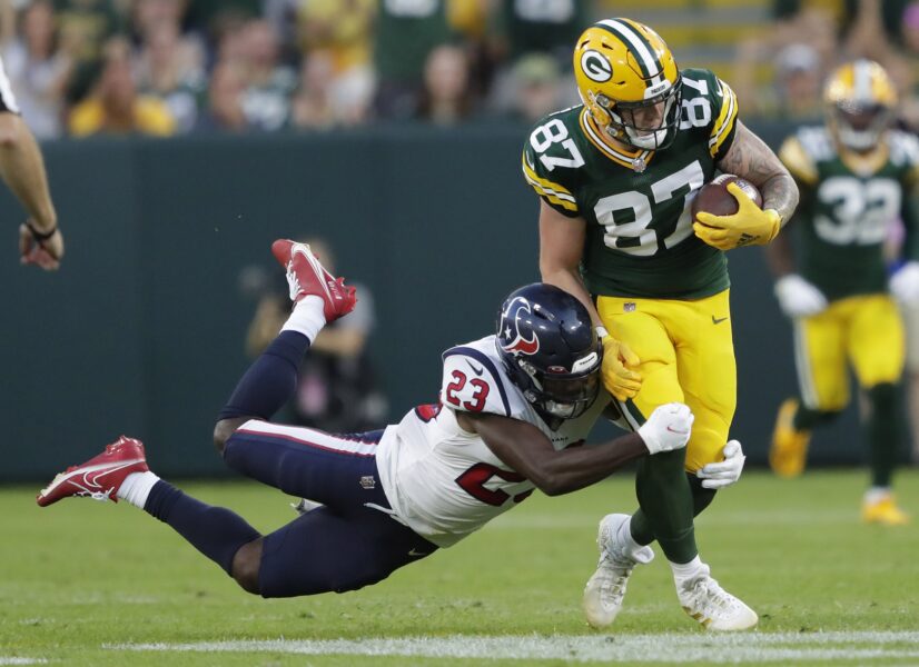 Aug 14, 2021; Green Bay, WI, USA; Green Bay Packers tight end Jace Sternberger (87) runs for yardage on a first down reception against Houston Texans safety Eric Murray (23) during their football game Saturday, August 14, 2021, at Lambeau Field in Green Bay, Wis. Mandatory Credit: Dan Powers-USA TODAY Sports