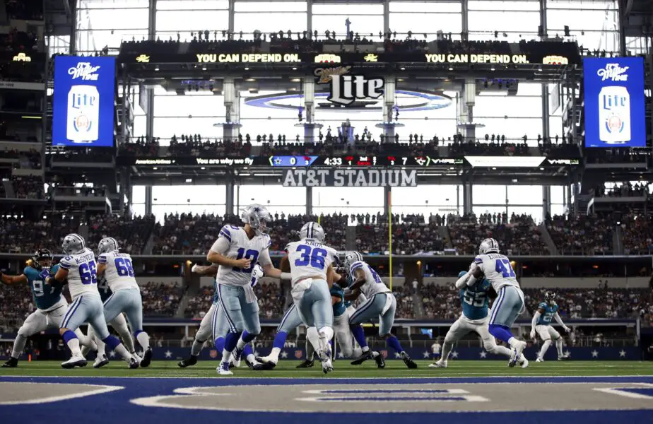 Aug 29, 2021; Arlington, Texas, USA; Dallas Cowboys quarterback Cooper Rush (10) hands off to running back Brenden Knox (36) in the first quarter against the Jacksonville Jaguars at AT&T Stadium. Mandatory Credit: Tim Heitman-USA TODAY Sports (Green Bay Packers)