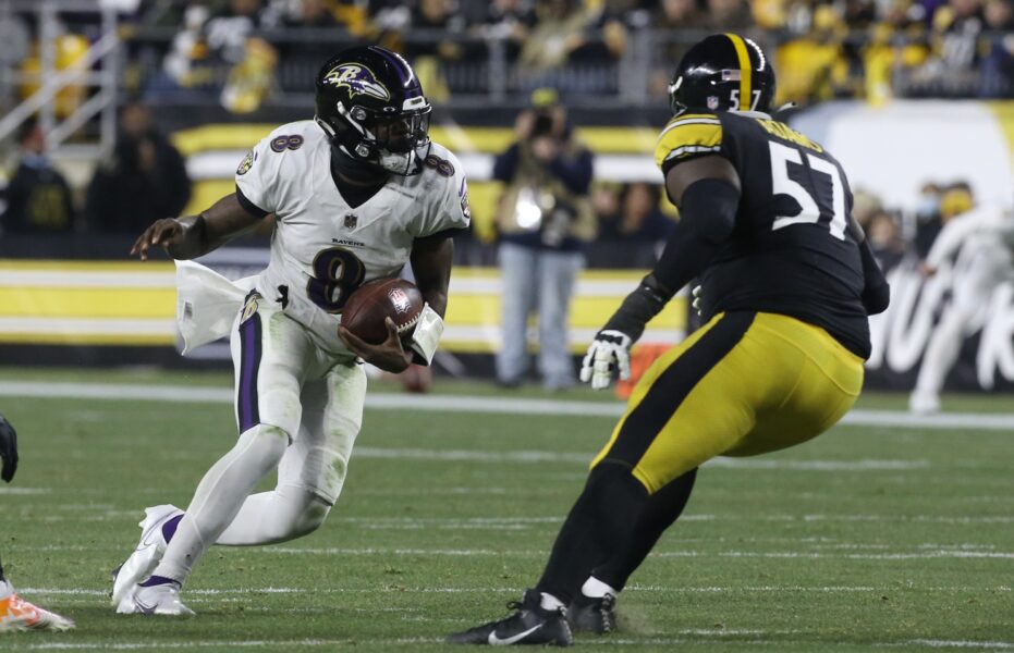 Dec 5, 2021; Pittsburgh, Pennsylvania, USA; Baltimore Ravens quarterback Lamar Jackson (8) carries the ball as Pittsburgh Steelers defensive tackle Montravius Adams (57) defends during the second quarter at Heinz Field. Mandatory Credit: Charles LeClaire-USA TODAY Sports (Green Bay Packers)