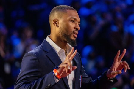 February 20, 2022; Cleveland, Ohio, USA; NBA great Damian Lillard is honored for being selected to the NBA 75th Anniversary Team during halftime in the 2022 NBA All-Star Game at Rocket Mortgage FieldHouse. Mandatory Credit: Kyle Terada-USA TODAY Sports (Milwaukee Bucks)