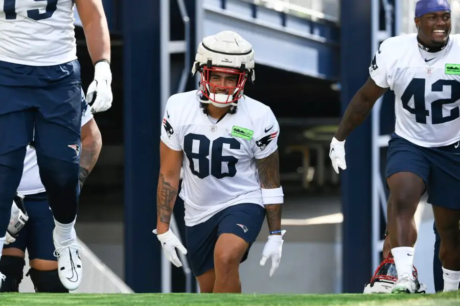 Jul 30, 2022; Foxborough, MA, USA; New England Patriots tight end Devin Asiasi (86) heads to the practice field at the Patriots training camp at Gillette Stadium. Mandatory Credit: Eric Canha-USA TODAY Sports (Green Bay Packers)