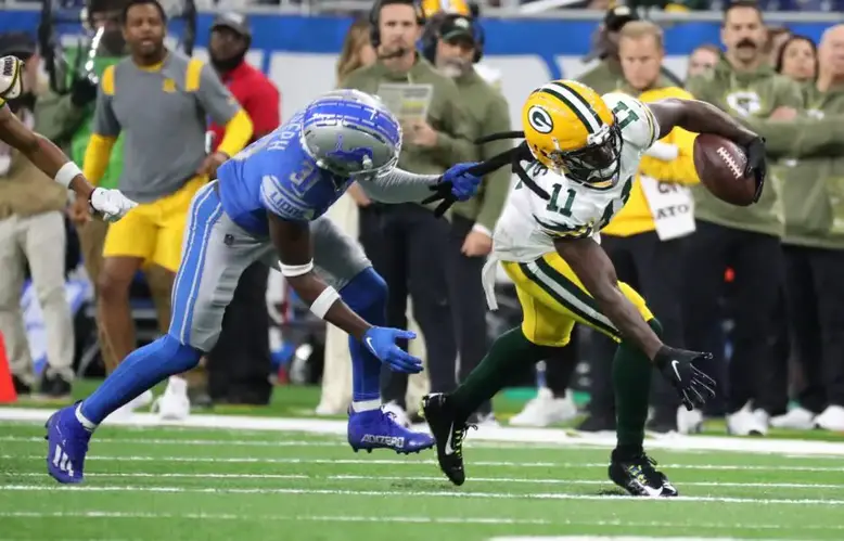 Nov 6, 2022; Detroit, Michigan, USA; Detroit Lions safety Kerby Joseph (31) tackles Green Bay Packers wide receiver Sammy Watkins (11) by the hair during first half at Ford Field. Mandatory Credit: Kirthmon F. Dozier-USA TODAY Sports