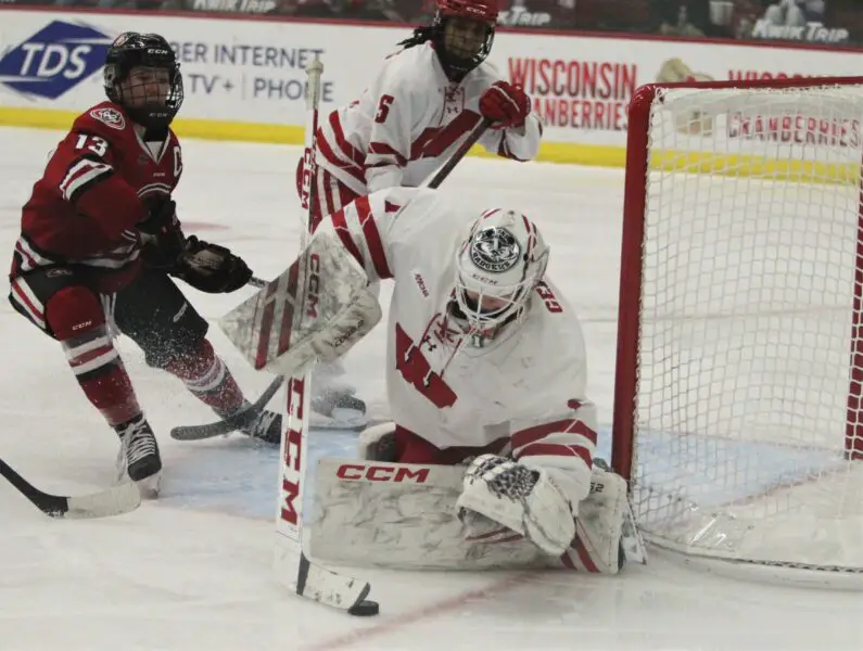 Wisconsin Badgers women's hockey goaltender Jane Gervais makes a save