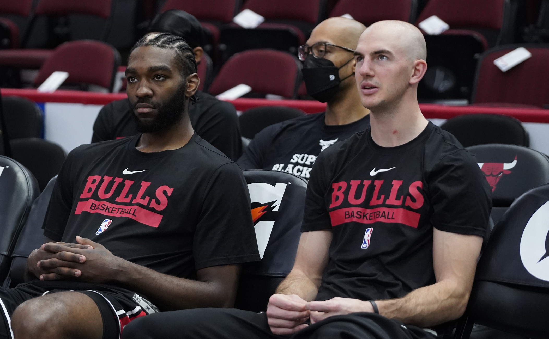 Mar 5, 2023; Chicago, Illinois, USA; Chicago Bulls forward Patrick Williams (left) and guard Alex Caruso (6) watch warms up before the game against the Indiana Pacers at United Center. Mandatory Credit: David Banks-USA TODAY Sports