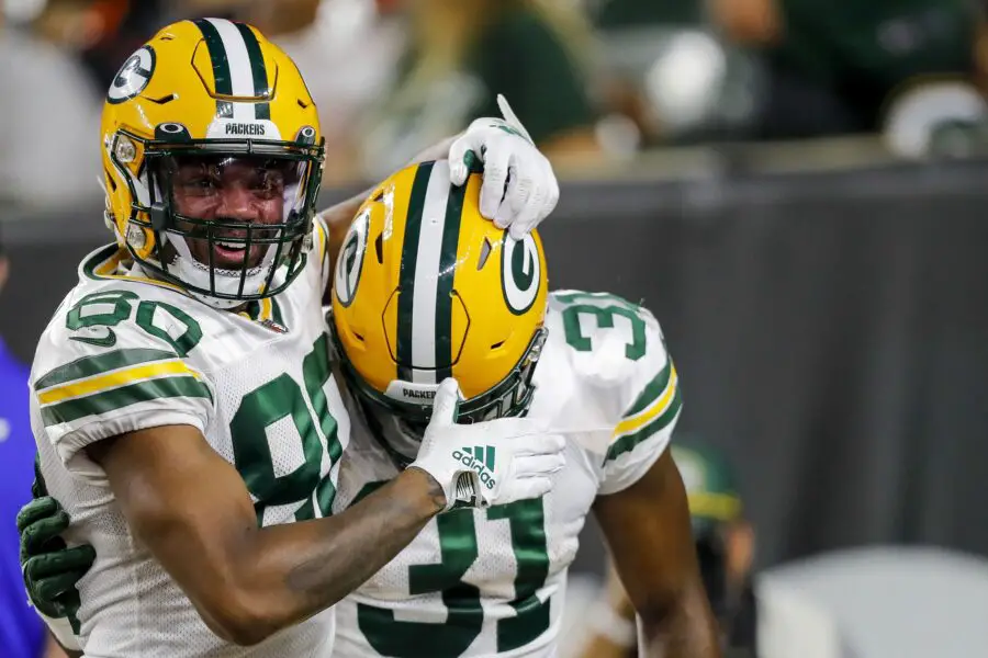 Aug 11, 2023; Cincinnati, Ohio, USA; Green Bay Packers wide receiver Bo Melton (80) reacts after running back Emanuel Wilson (31) scored a touchdown against the Cincinnati Bengals in the second half at Paycor Stadium. Mandatory Credit: Katie Stratman-USA TODAY Sports