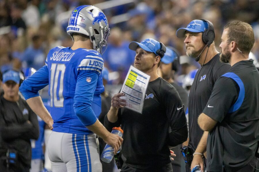 Aug 11, 2023; Detroit, Michigan, USA; The Detroit Lions offensive coordinator Ben Johnson and head coach Dan Campbell talk to quarterback Nate Sudfeld (10) on a time out late in the second quarter against the New York Giants at Ford Field. Mandatory Credit: David Reginek-USA TODAY Sports