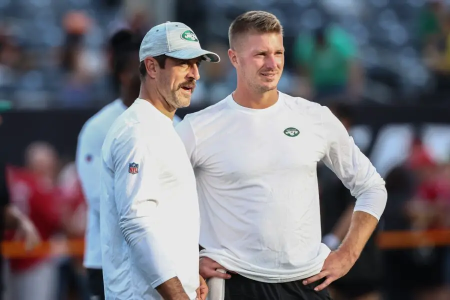 Aug 19, 2023; East Rutherford, New Jersey, USA; New York Jets quarterback Aaron Rodgers (8) speaks with New York Jets quarterback Tim Boyle (7) during warmups for the Jets game against the Tampa Bay Buccaneers at MetLife Stadium. Mandatory Credit: Ed Mulholland-USA TODAY Sports (Green Bay Packers)