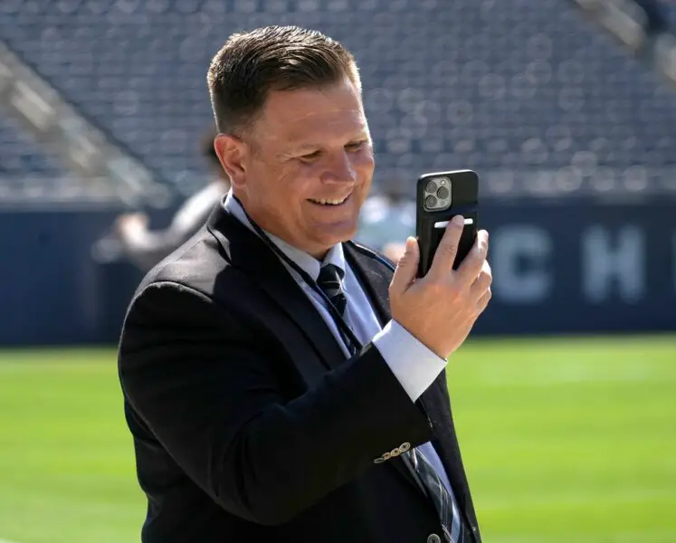 Green Bay Packers general manager Brian Gutekunst face times before the Green Bay Packers play the Chicago Bears on Sunday, Sept. 10, 2023 at Soldier Field in Chicago. © Mike De Sisti / Milwaukee Journal Sentinel / USA TODAY NETWORK
