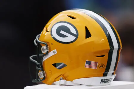 Sep 24, 2023; Green Bay, Wisconsin, USA; A Green Bay Packers helmet sits on the sidelines during the game against the New Orleans Saints at Lambeau Field. Mandatory Credit: Jeff Hanisch-USA TODAY Sports