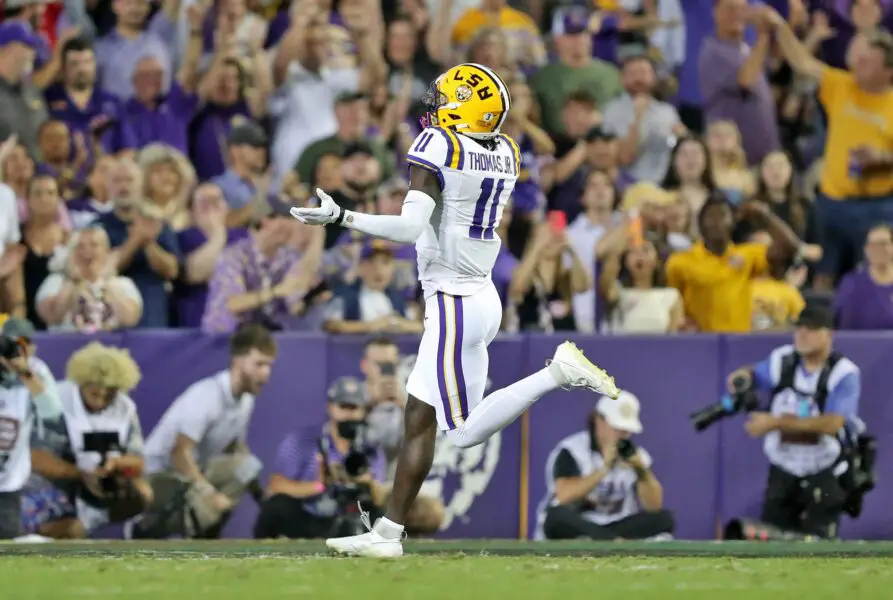 Oct 21, 2023; Baton Rouge, Louisiana, USA; LSU Tigers wide receiver Brian Thomas Jr. (11) celebrates his touchdown against the Army Black Knights during the first half at Tiger Stadium. Mandatory Credit: Danny Wild-USA TODAY Sports (Green Bay Packers)