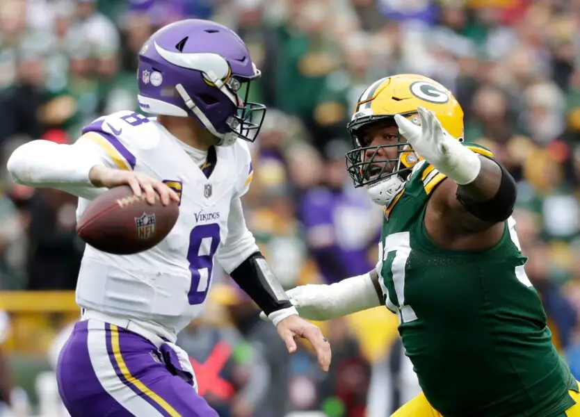 Green Bay Packers defensive tackle Kenny Clark (97) pressures Minnesota Vikings quarterback Kirk Cousins (8) during their football game Sunday, October 29, 2023, at Lambeau Field in Green Bay, Wis. Minnesota defeated Green Bay 24-10. Wm. Glasheen USA TODAY NETWORK-Wisconsin