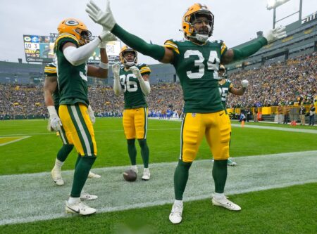 Green Bay Packers defenders including Green Bay Packers safety Jonathan Owens (34) celebrate Green Bay Packers safety Anthony Johnson Jr. (36) interception during the second half of their game on Sunday, Nov. 5, 2023 at Lambeau Field in Green Bay.