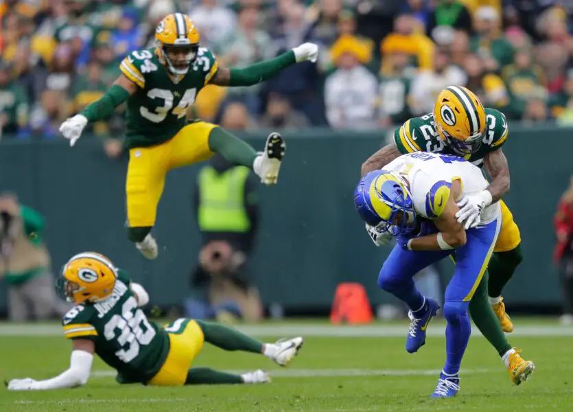 Green Bay Packers cornerback Jaire Alexander (23) tackles Los Angeles Rams wide receiver Cooper Kupp (10) on a first down reception during their football game Sunday, November 5, 2023, at Lambeau Field in Green Bay, Wis. Dan Powers/USA TODAY NETWORK-Wisconsin.