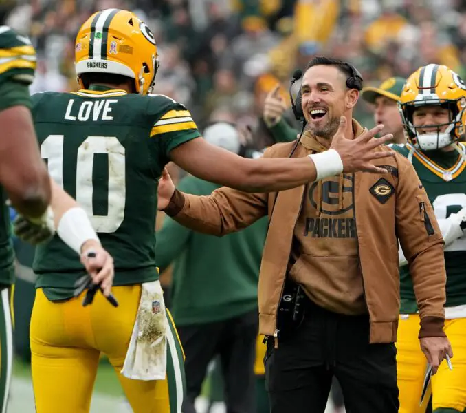 Green Bay Packers quarterback Jordan Love (10) is hugged by head coach Matt LaFleur after throwing a touchdown pass during the fourth quarter of their game at Lambeau Field Sunday, November 5, 2023 in Green Bay, Wisconsin. The Green Bay Packers beat the Los Angeles Rams 20-3. © Mark Hoffman/Milwaukee Journal Sentinel / USA TODAY NETWORK