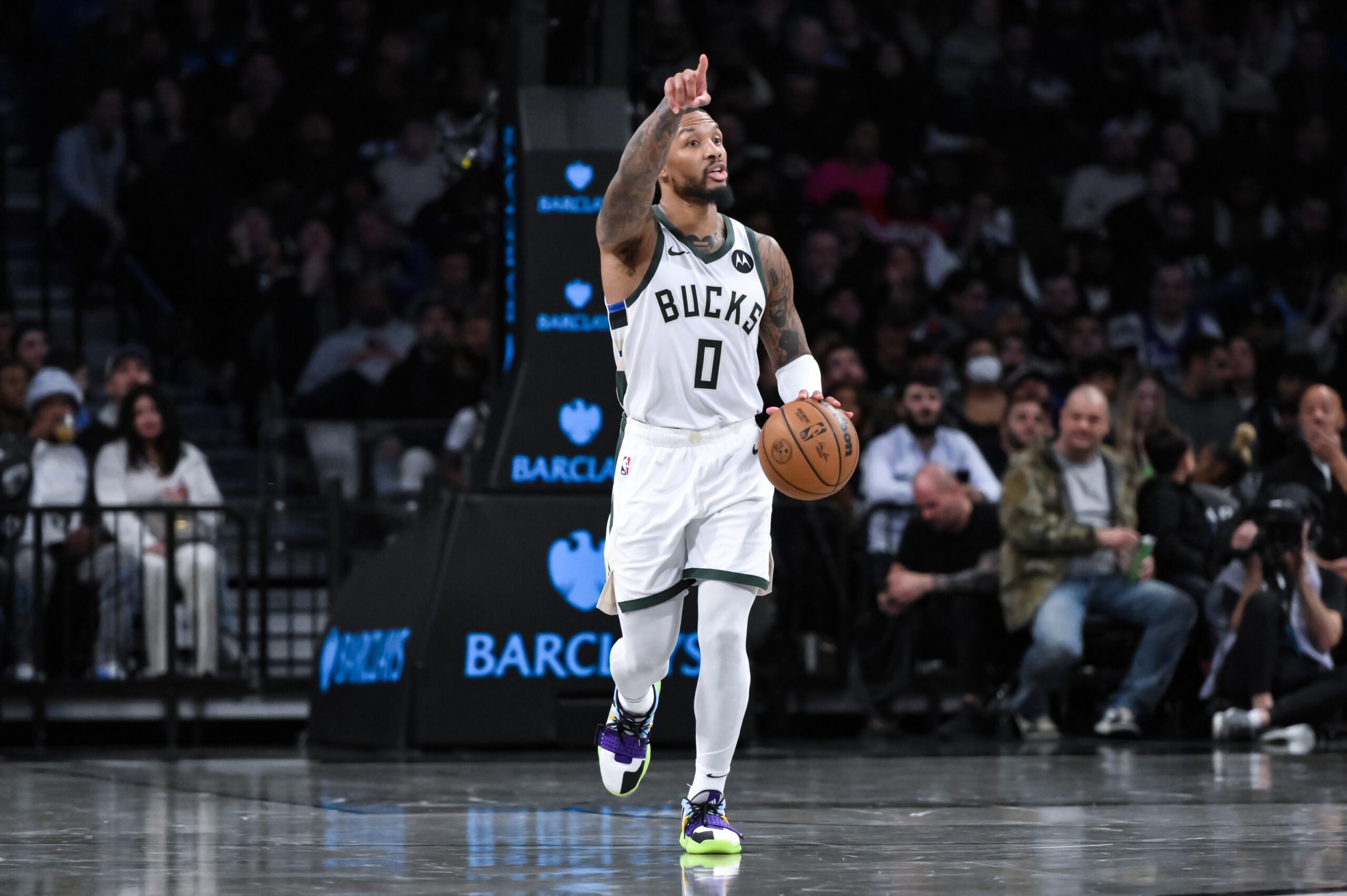 Nov 6, 2023; Brooklyn, New York, USA; Milwaukee Bucks guard Damian Lillard (0) sets the play against the Brooklyn Nets during the third quarter at Barclays Center. Mandatory Credit: John Jones-USA TODAY Sports