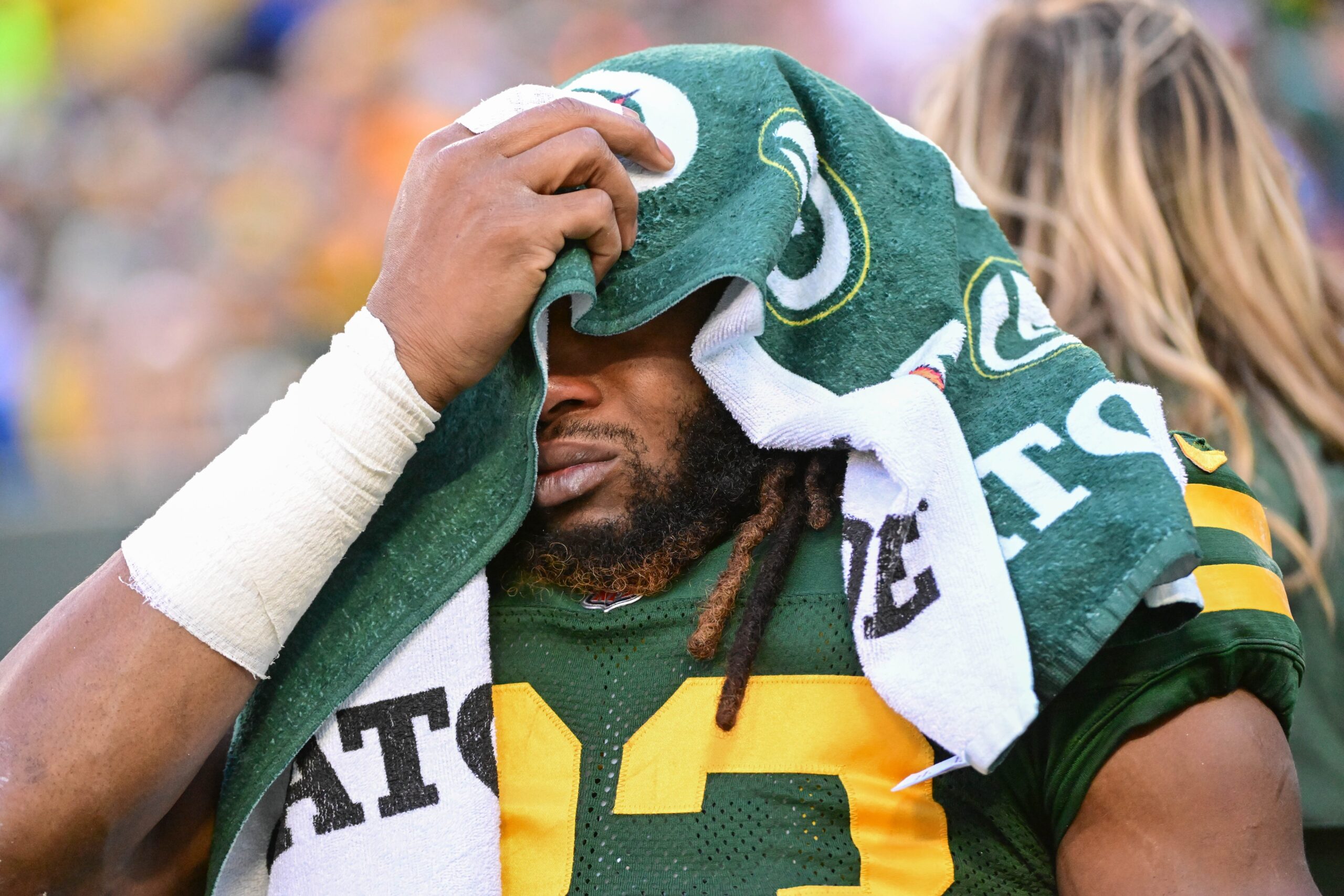 Nov 19, 2023; Green Bay, Wisconsin, USA; Green Bay Packers running back Aaron Jones (33) reacts as he was carted off the field after he was injured in the second quarter against the Los Angeles Chargers at Lambeau Field. Mandatory Credit: Benny Sieu-USA TODAY Sports