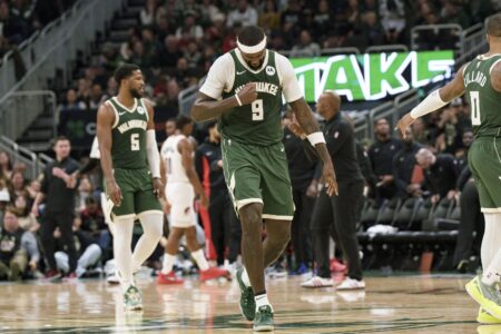 Nov 26, 2023; Milwaukee, Wisconsin, USA; Milwaukee Bucks forward Bobby Portis (9) reacts after scoring a basket during the fourth quarter against the Portland Trail Blazers at Fiserv Forum. Mandatory Credit: Jeff Hanisch-USA TODAY Sports