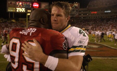 Green Bay Packers Brett Favre embraces Tampa Bay Buccaneers Warren Sapp following Green Bay's 20-13 win Sunday, November 16, 2003 at Raymond James Stadium in Tampa, Fla. © File photo, Milwaukee Journal Sentinel via Imagn Content Services, LLC